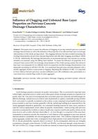 Influence of Clogging and Unbound Base Layer Properties on Pervious Concrete Drainage Characteristics